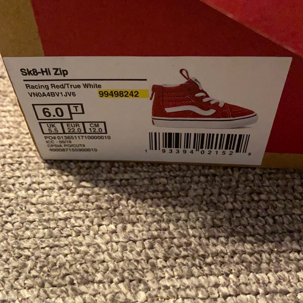 Toddler red Vans size 6. Zips up in the back.